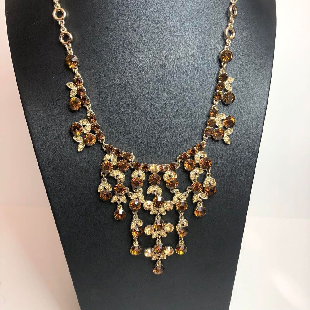 597 Amber colored CZ Godltone dramatic bib drop necklace